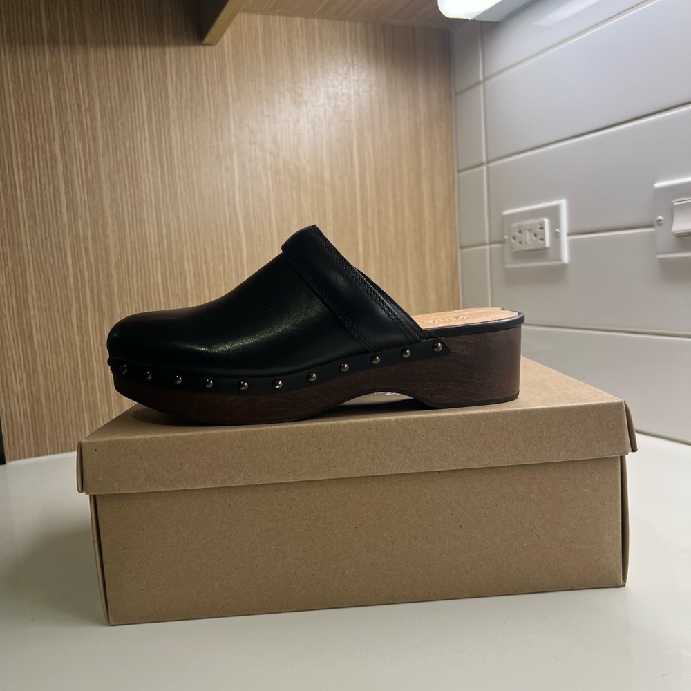 Black leather mules